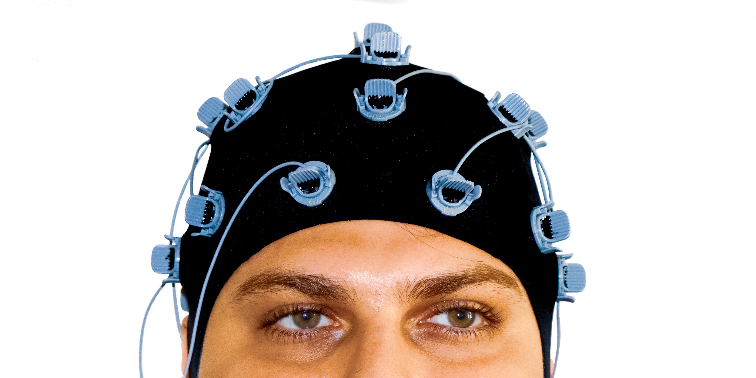 A person wearing a BCI device